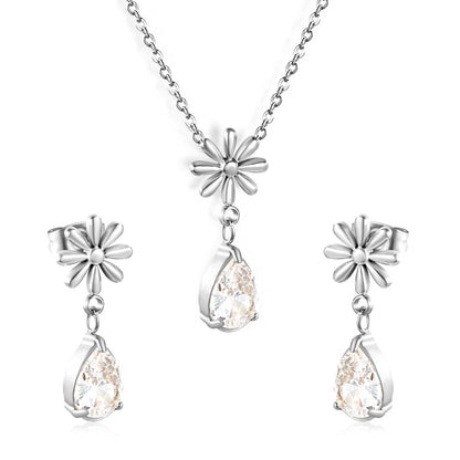 Flower + drop white diamond set Steel / Gold Earrings: 8.3mm flower + 6.2*10mm drop white diamond Pendant: 8.9mm flower + 6.2*10mm drop white diamond 0.3 Cross chain 42+5cm+6mm round plate asonjewelry