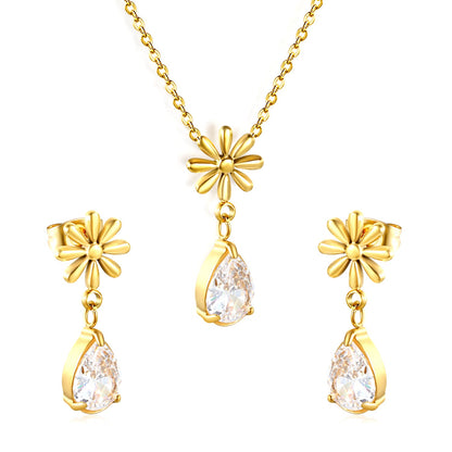 Flower + drop white diamond set Steel / Gold Earrings: 8.3mm flower + 6.2*10mm drop white diamond Pendant: 8.9mm flower + 6.2*10mm drop white diamond 0.3 Cross chain 42+5cm+6mm round plate asonjewelry