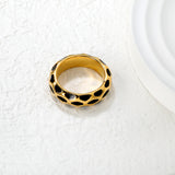 5.5mm irregular hammered/black drip ring in steel/gold