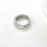 5.5mm irregular hammered/black drip ring in steel/gold