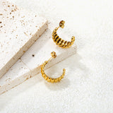 8.5x21mm curved horn stud earrings, gold