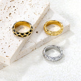 5.5mm irregular hammered/black drip ring in steel/gold