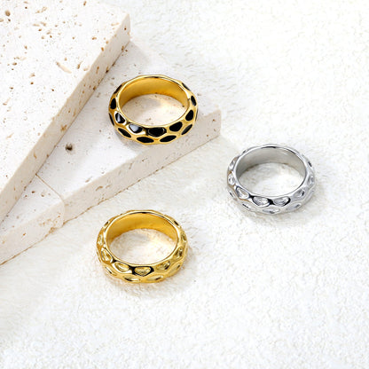 5.5mm irregular hammered/black drip ring in steel/gold asonjewelry