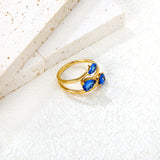 15mm Gold Open Ring with Three Claw - Set Blue Zircons