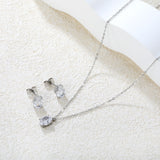 Oval Zirconia Set Gold/Steel Tone Studs: 6*8mm Pendant: 6*8mm 0.3ct Cross Chain 40+5cm + 6mm Round Tag