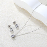 Round Zirconia Set Gold/Steel Earrings: 7mm Pendant: 7mm 0.3mm Cross Chain 40+5cm + 6mm Round Tag