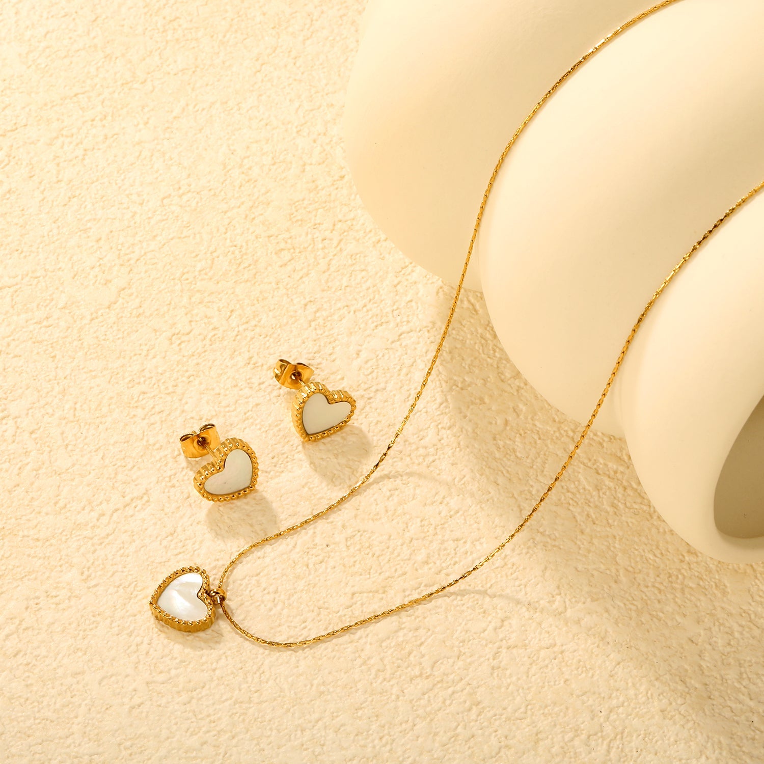 Heart-Shaped White Shell Set in Gold Stud Earrings: 10.7*9.7mm Pendant: 10.7*9.7mm 0.3mm Cross-Hammer Round Chain 40+5cm + 6mm Round Tag asonjewelry
