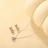Round Zirconia Set Gold/Steel Earrings: 7mm Pendant: 7mm 0.3mm Cross Chain 40+5cm + 6mm Round Tag