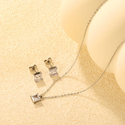 Square Zirconia Set Gold/Steel Tone Studs: 7mm Pendant: 7mm 0.3ct Cross Chain 40+5cm + 6mm Round Tag asonjewelry