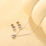 Square Zirconia Set Gold/Steel Tone Studs: 7mm Pendant: 7mm 0.3ct Cross Chain 40+5cm + 6mm Round Tag
