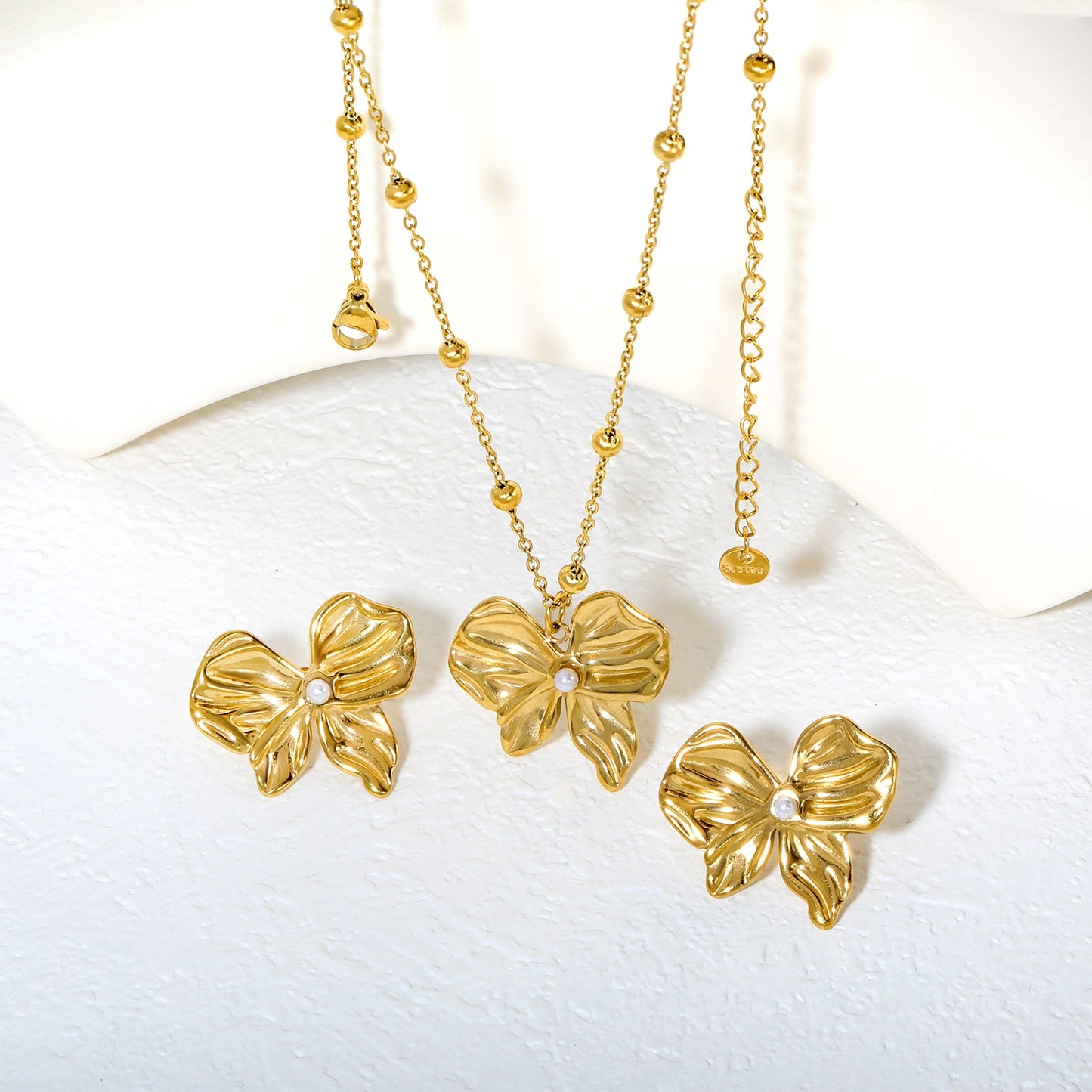 Imitation Pearl French Bow Set, Gold Earrings: 28*24.5mm Pendant: 28*24.5mm 0.4mm Pearl Cross Chain 40+5cm + 6mm Round Tag asonjewelry