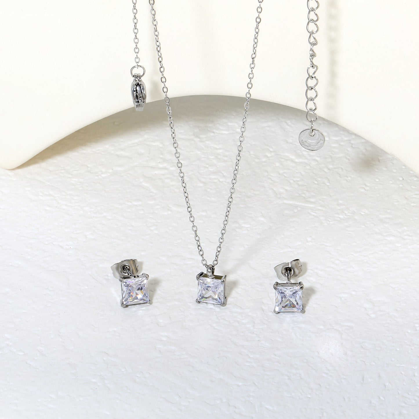 Square Zirconia Set Gold/Steel Tone Studs: 7mm Pendant: 7mm 0.3ct Cross Chain 40+5cm + 6mm Round Tag asonjewelry