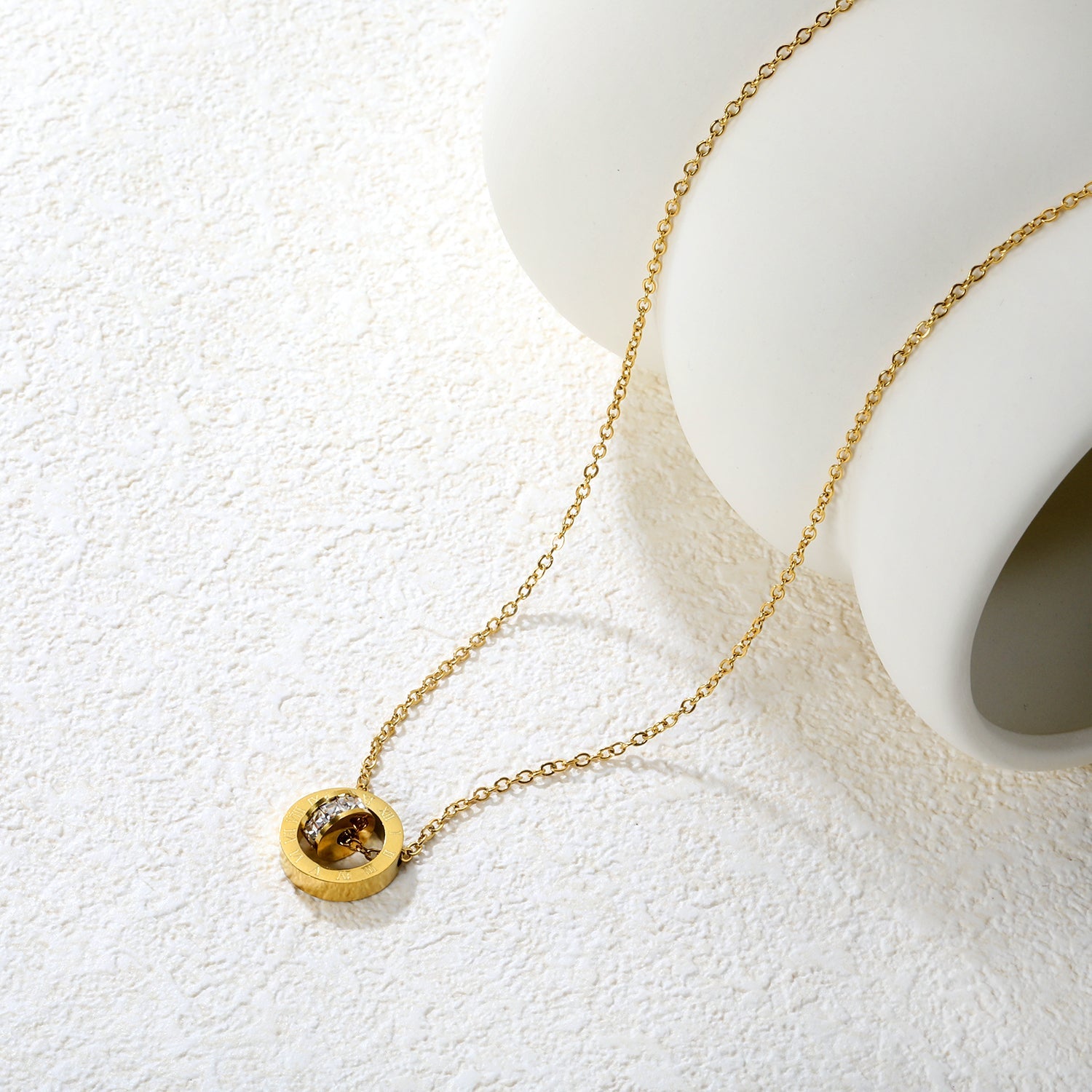 Diamond-set design necklace engraved with Roman numerals, gold asonjewelry