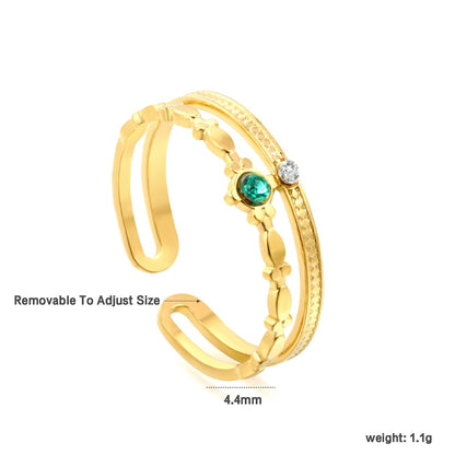 Open center ring with white and green diamonds. asonjewelry
