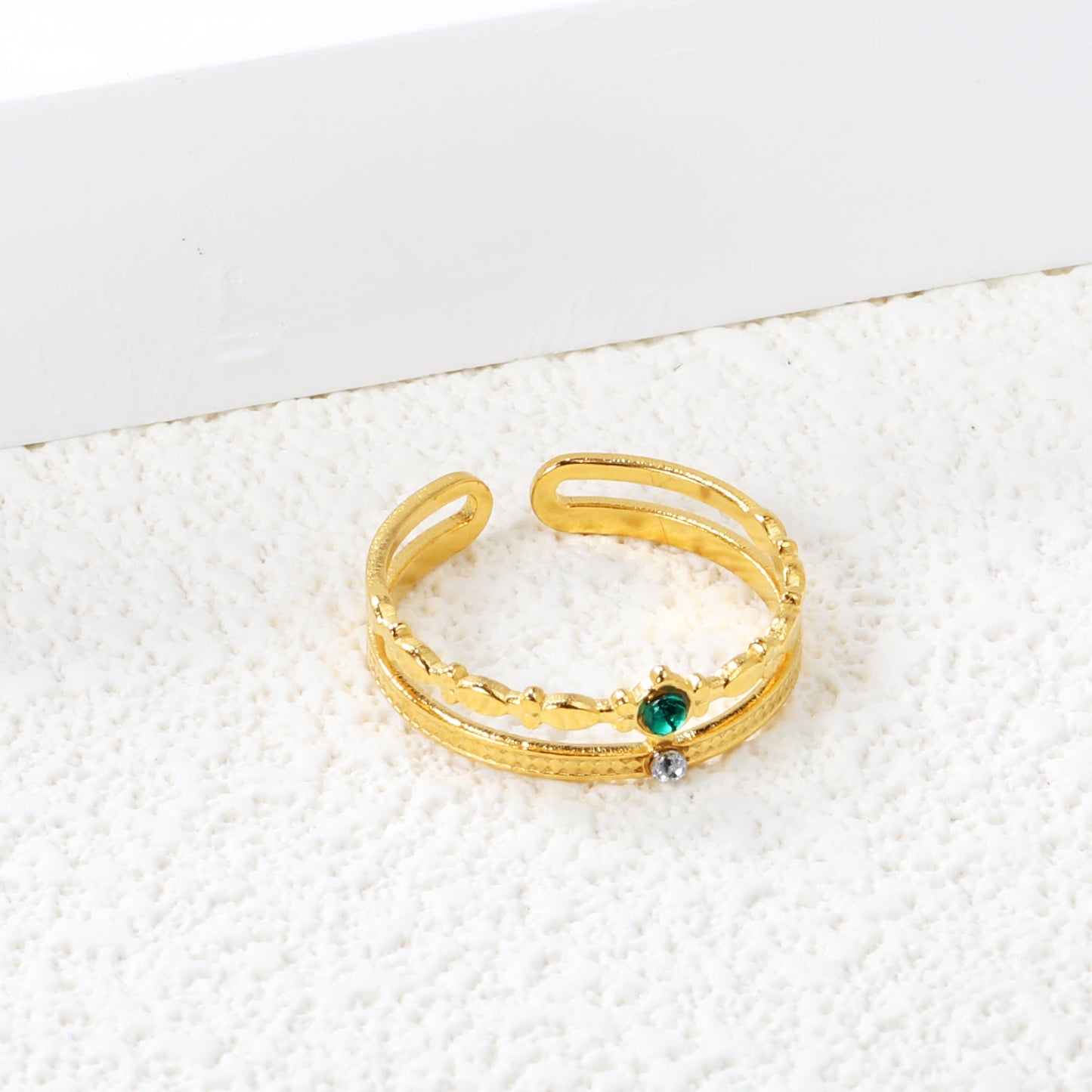 Open center ring with white and green diamonds. asonjewelry