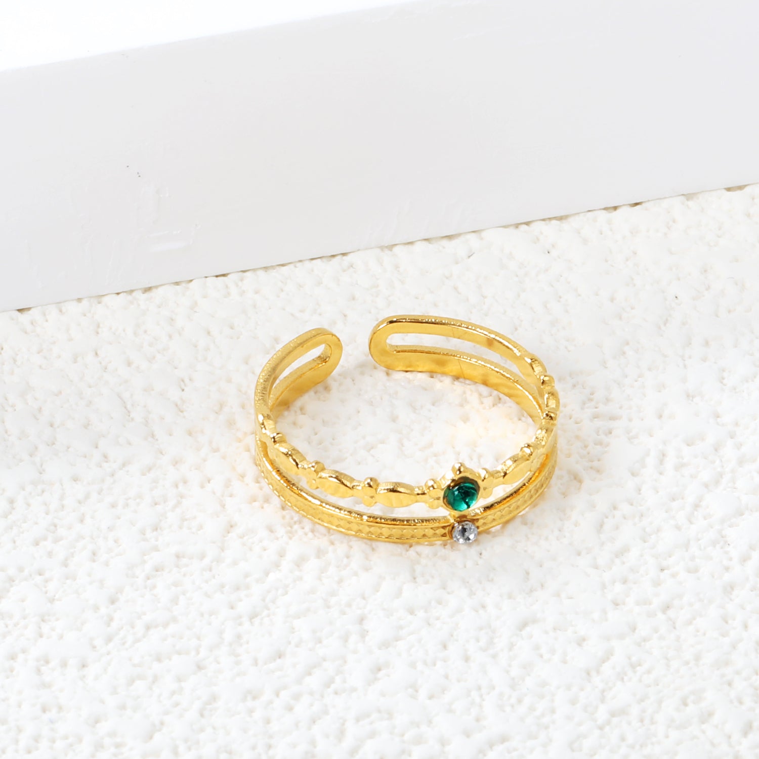 Open center ring with white and green diamonds. asonjewelry