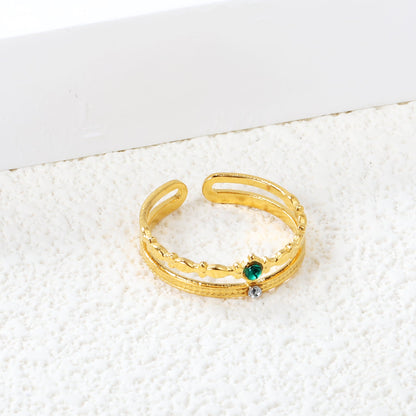 Open center ring with white and green diamonds. asonjewelry