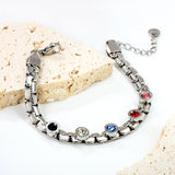 6.5mm round cake with mixed color zirconia+width 6*thick 2.8mm chain Bracelet 17cm+3cm+6mm round end tag Steel/Golden