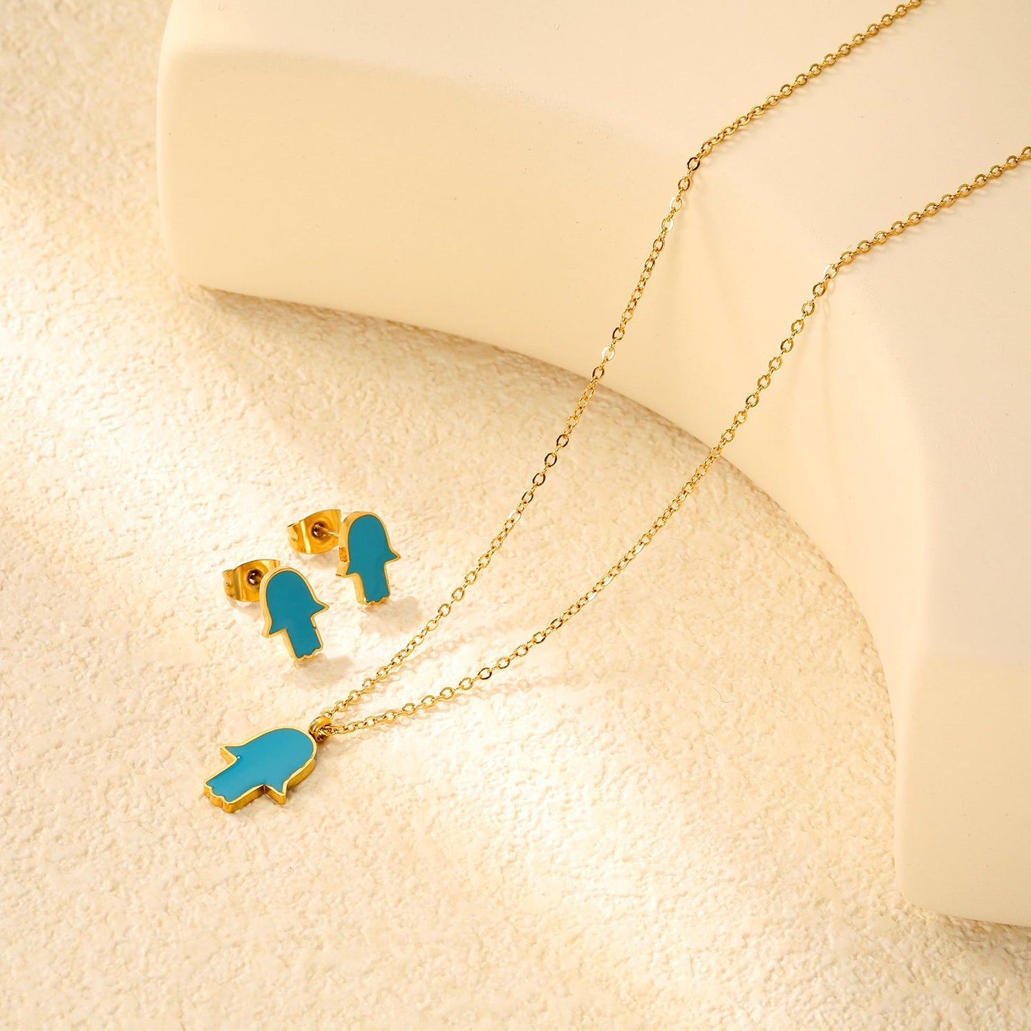 Glossy set Gold/light blue Earrings: 8.7*10.8mm Pendant: 10.7*13.6mm 0.3 cross chain 40+5cm+6mm round plate asonjewelry