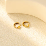3.9 x 6.2 mm skull-shaped polished earring, ear hook 2.2 x inner diameter 10 mm, earring, gold color