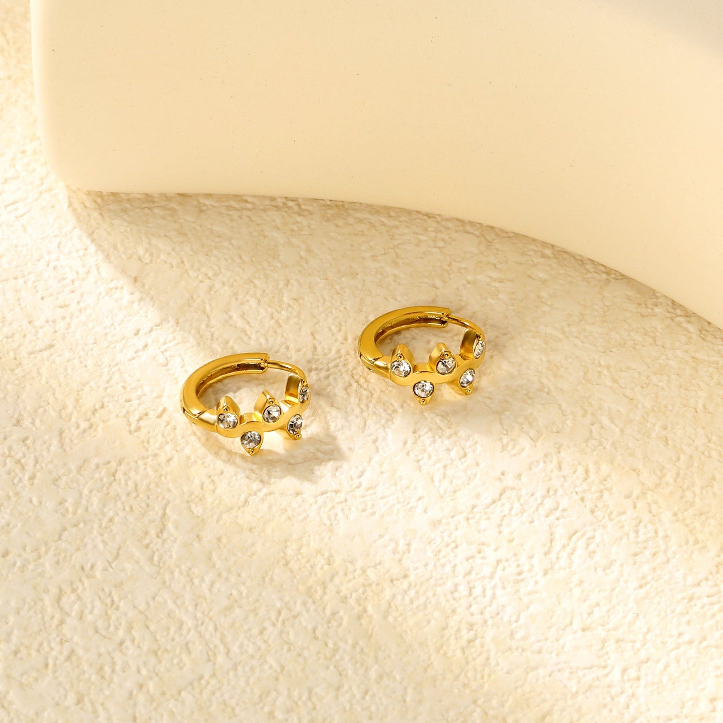 6.8 x 10.6mm vine-shaped white Czech crystal stud earrings with 2.2mm post and 10mm inner diameter, gold-plated asonjewelry