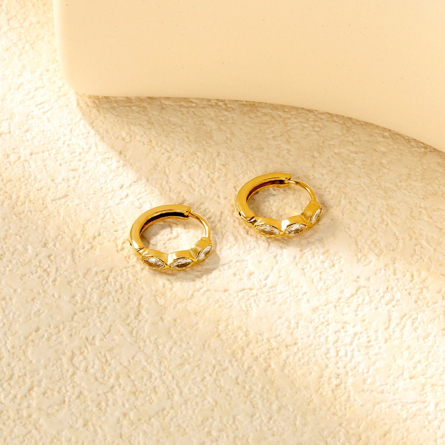 2.9 x 12mm three oval-shaped white zirconia earrings with 2.2 x 10mm inner diameter ear hooks, gold color asonjewelry