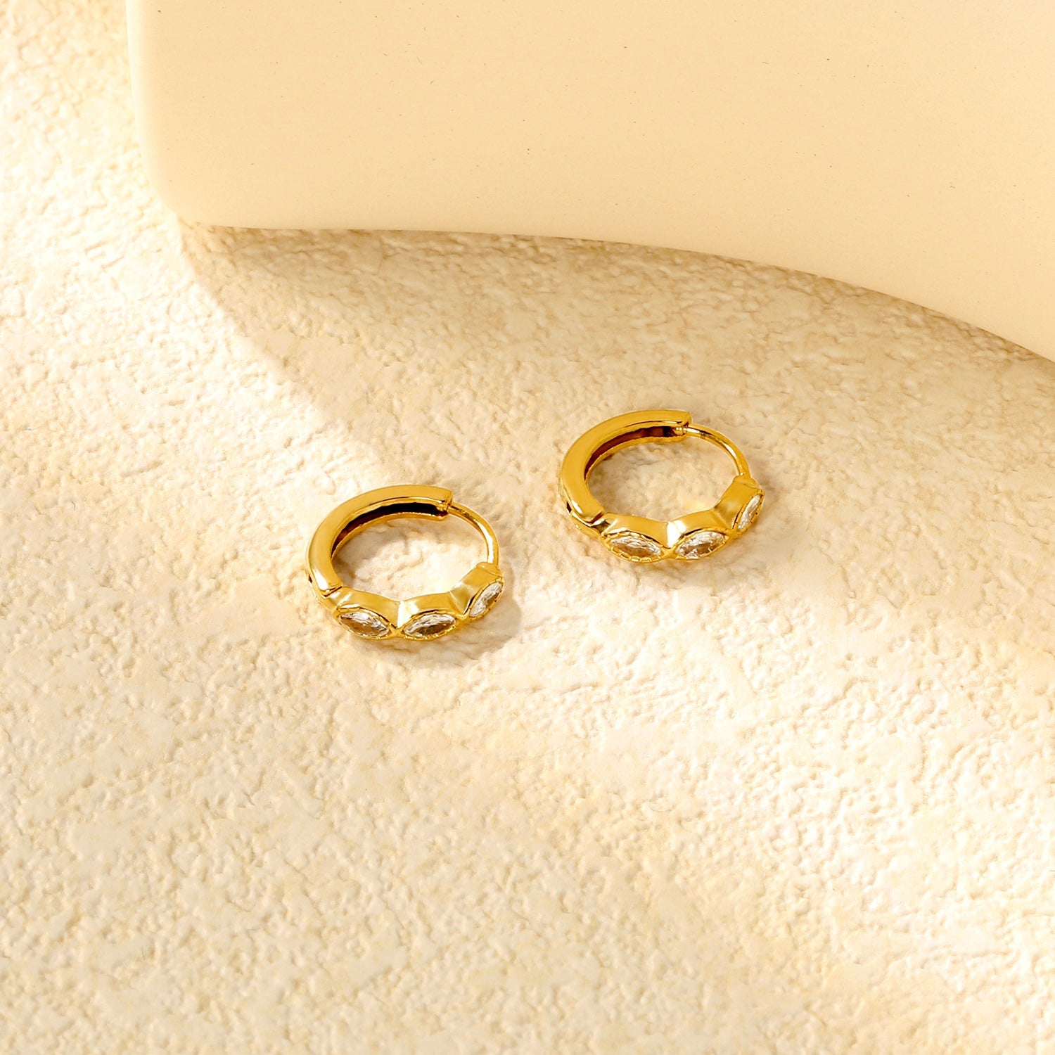 2.9 x 12mm three oval-shaped white zirconia earrings with 2.2 x 10mm inner diameter ear hooks, gold color asonjewelry