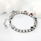 6.5mm round cake with mixed color zirconia+width 6*thick 2.8mm chain Bracelet 17cm+3cm+6mm round end tag Steel/Golden