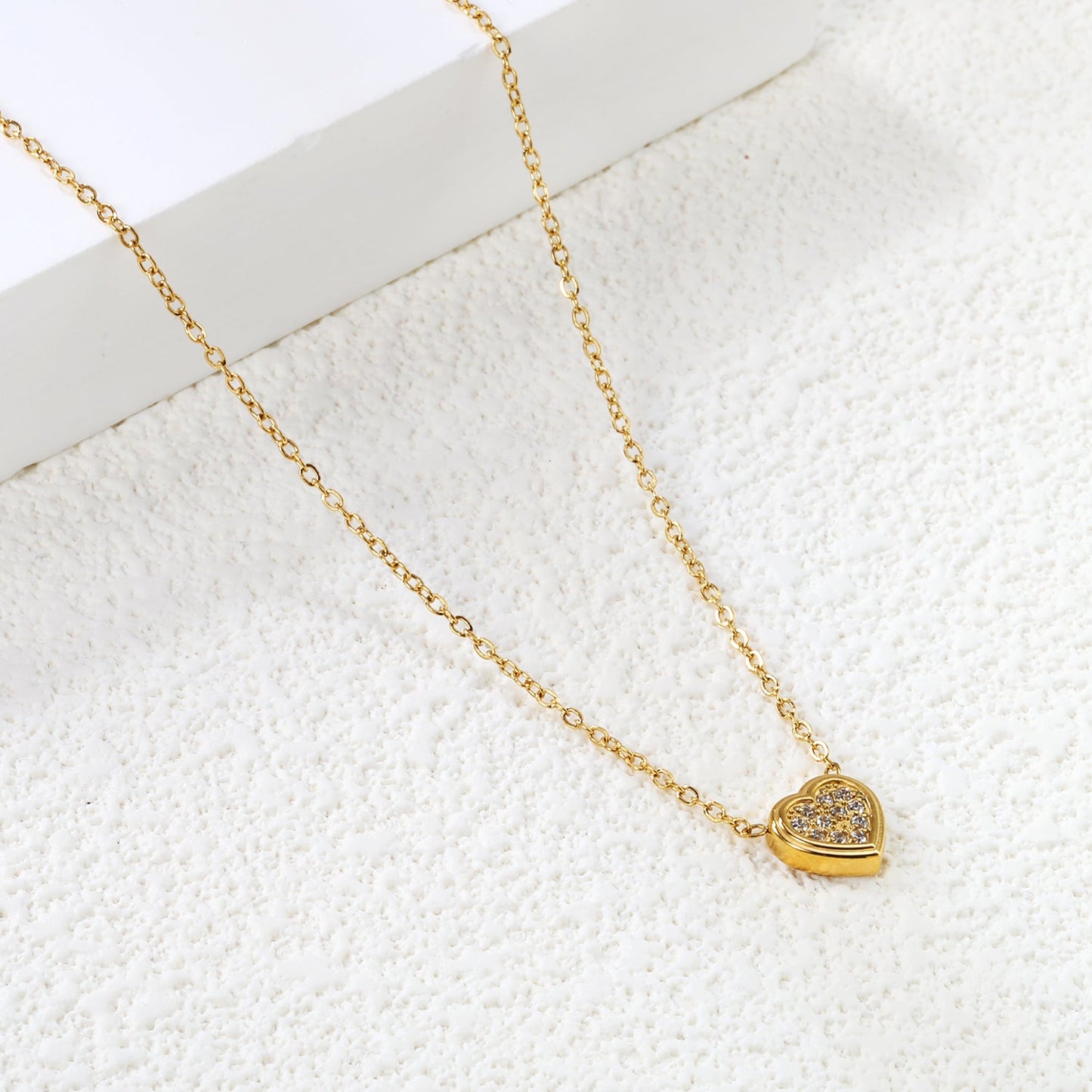 7.7 x 8mm beveled heart-shaped CNC white zirconia pendant with 0.3mm cross chain (40+5cm) and 6mm round tag necklace in steel gray/gold asonjewelry