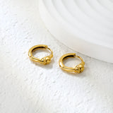 3.9 x 6.2 mm skull-shaped polished earring, ear hook 2.2 x inner diameter 10 mm, earring, gold color