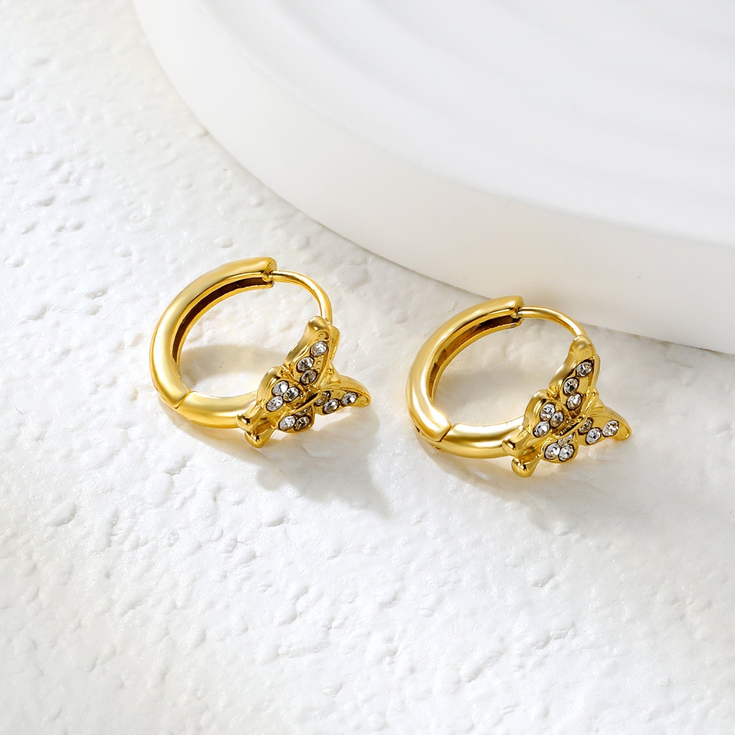 10.3 x 8.8mm butterfly-shaped white zirconia earring with a 2.2mm earring post and a 10mm inner diameter, gold-colored asonjewelry