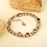 6.5mm round cake with mixed color zirconia+width 6*thick 2.8mm chain Bracelet 17cm+3cm+6mm round end tag Steel/Golden