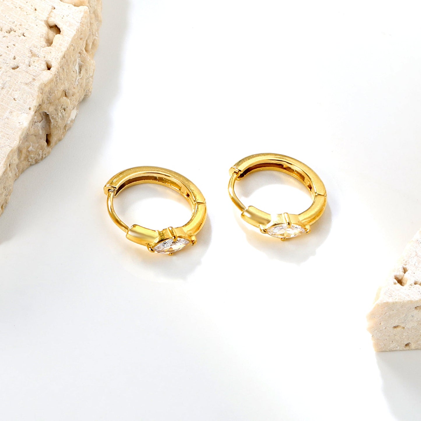 3.7 x 6.7mm diamond-shaped white zirconia stud earrings with a 2.2mm post and a 10mm inner diameter, gold-colored asonjewelry