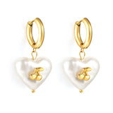 3x15mm circle with heart shaped white pearl + cherry stud earrings steel color / gold color