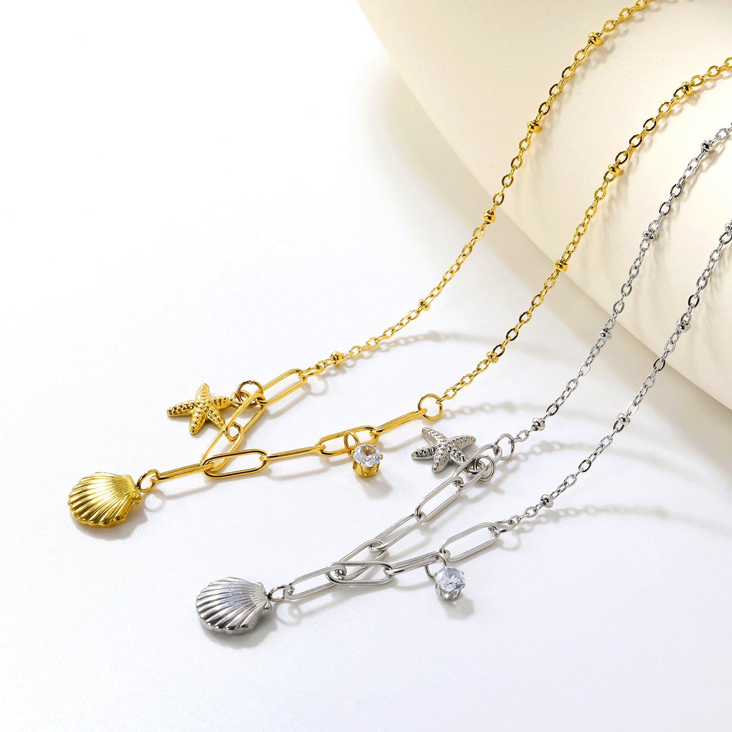 10.2*10.7mm shell+9*12.7mm starfish+4.2mm cylindrical white diamonds 42+5cm+10*3cm necklace steel/golden asonjewelry