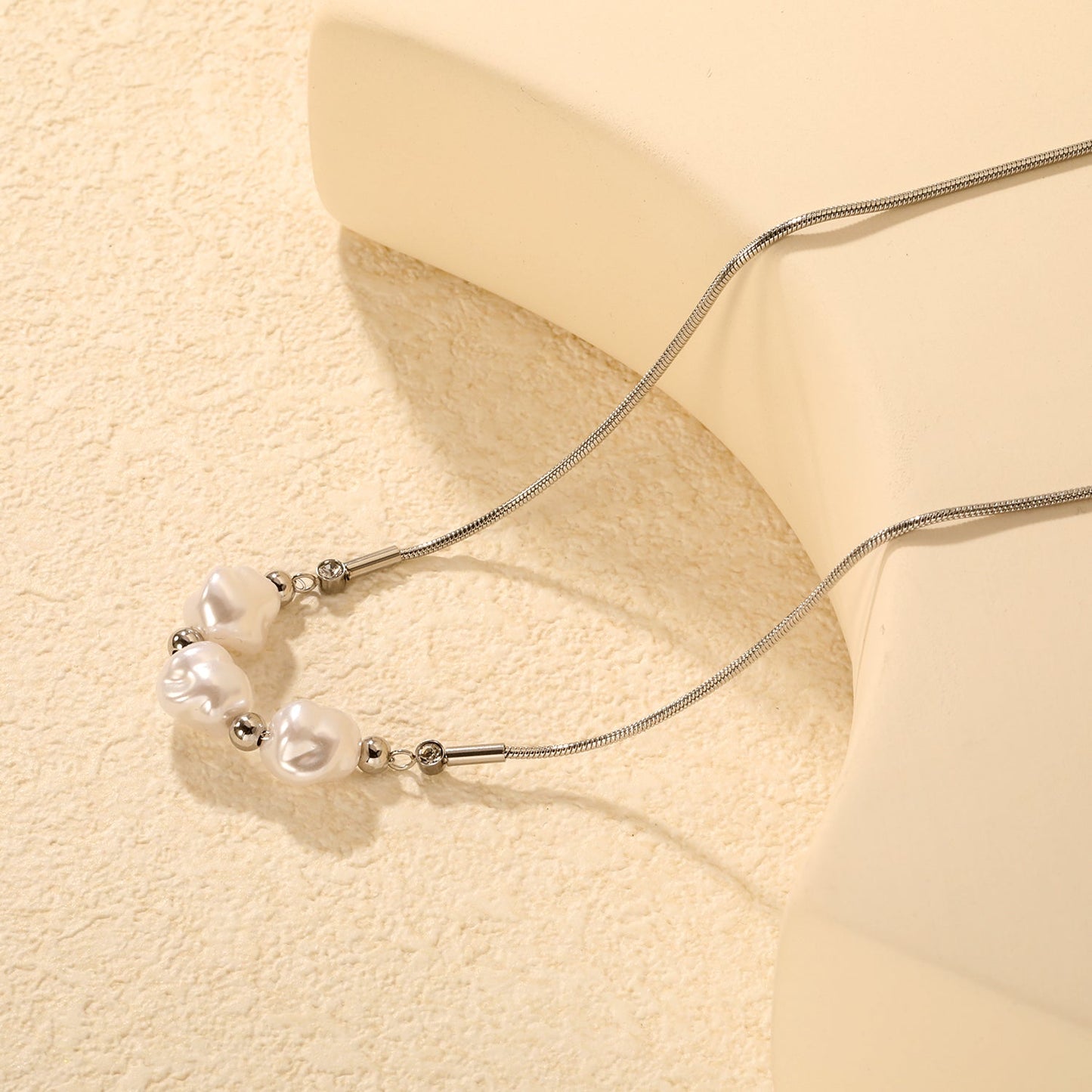 3 imitation pearls + 4 steel beads + round snake chain with round pendant Necklace in steel/gold asonjewelry