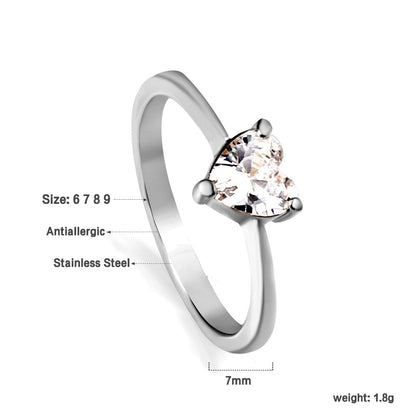 White diamond heart shaped three claw ring asonjewelry