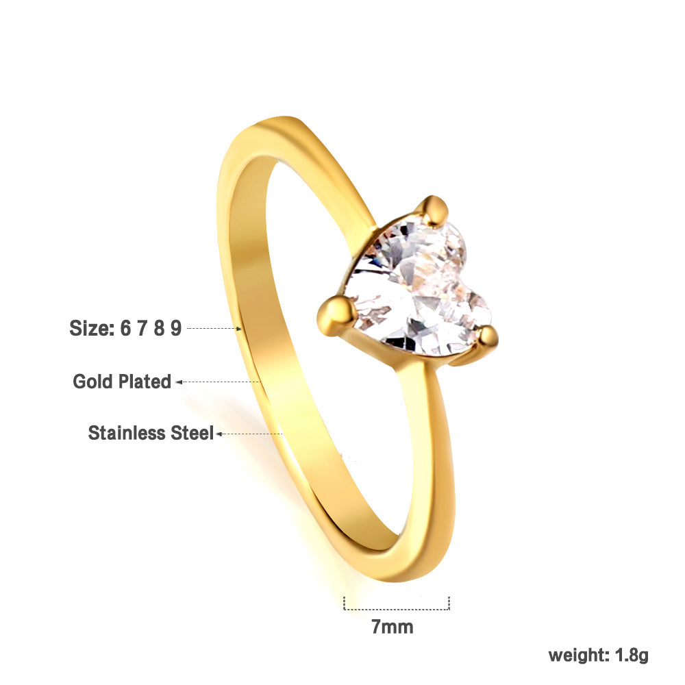 White diamond heart shaped three claw ring asonjewelry