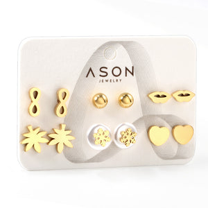 Six pairs of mixed card mounted cut glossy lips / maple leaf stud earrings gold color