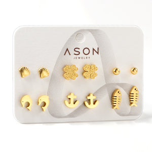 Six pairs of mixed card mounted cut-out shell / fishbone / dolphin stud earrings gold color