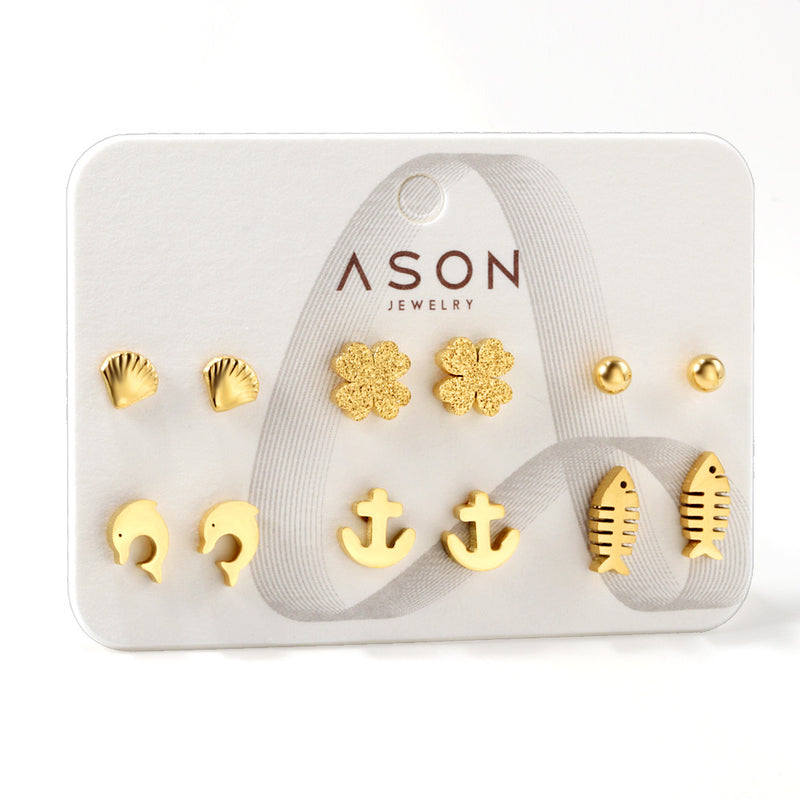 Six pairs of mixed card mounted cut-out shell / fishbone / dolphin stud earrings gold color