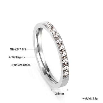 Solitaire ring with 10 small round diamonds gold/steel color asonjewelry