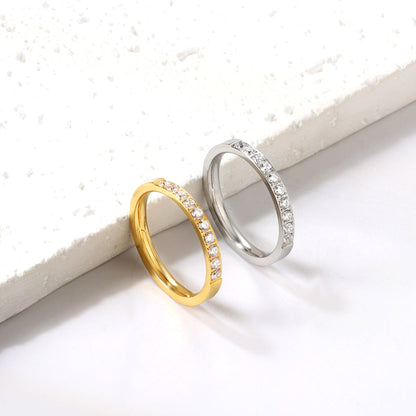 Solitaire ring with 10 small round diamonds gold/steel color asonjewelry