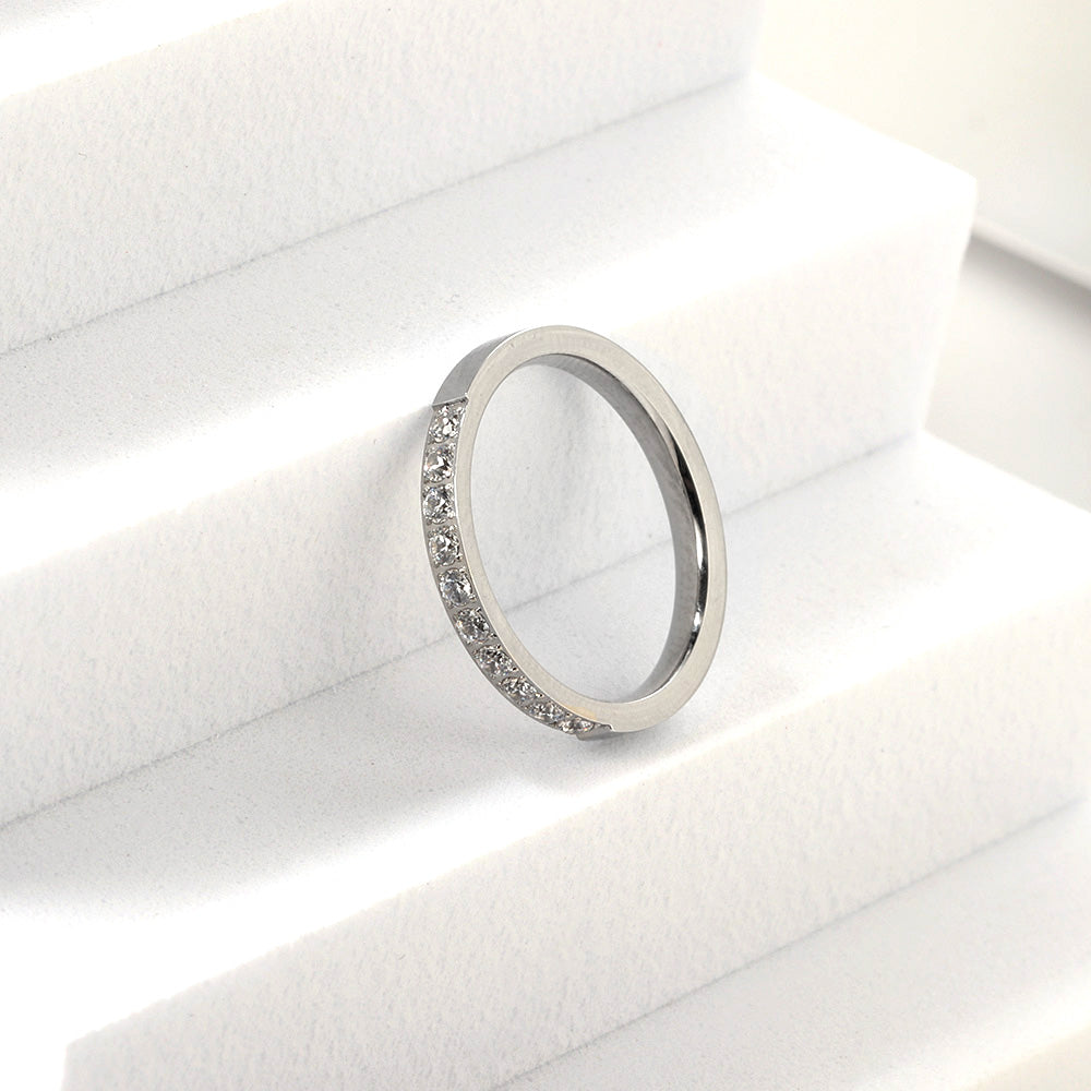 Solitaire ring with 10 small round diamonds gold/steel color asonjewelry