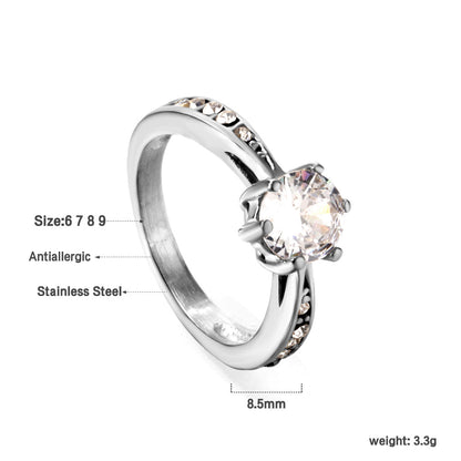 Solitaire ring with several small diamonds + one large round diamond Gold/steel color asonjewelry