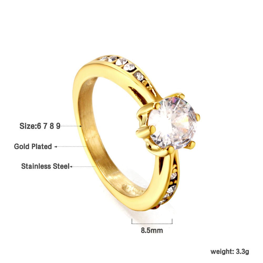 Solitaire ring with several small diamonds + one large round diamond Gold/steel color asonjewelry