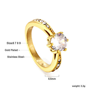 Solitaire ring with several small diamonds + one large round diamond Gold/steel color