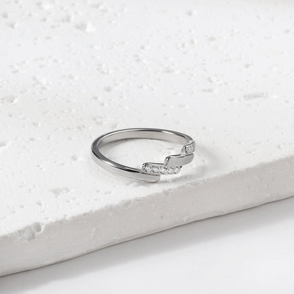 A beautifully designed ring with small round diamonds. asonjewelry