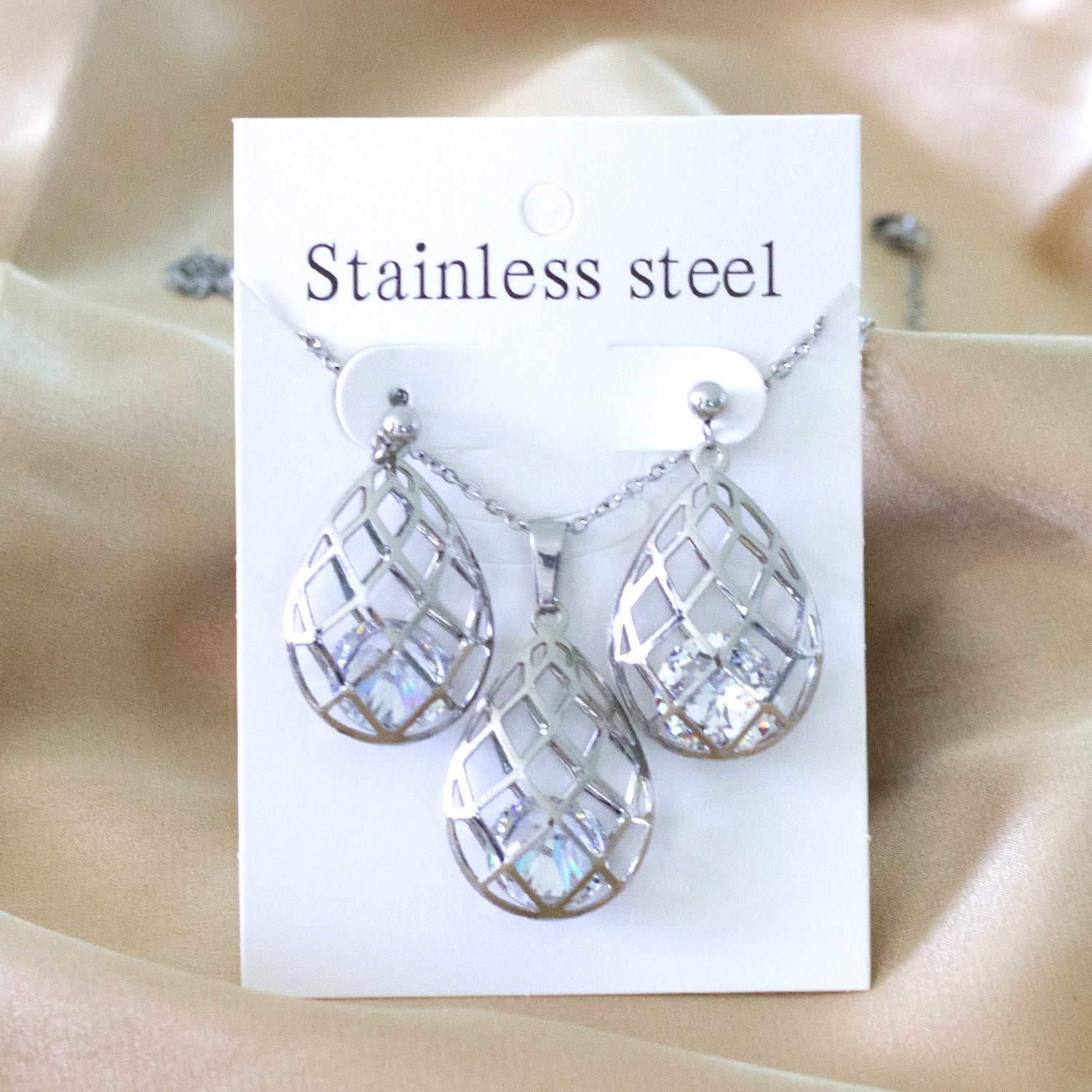 Gold/steel emery mesh hollowed out teardrop interior + diamond jewelry set asonjewelry