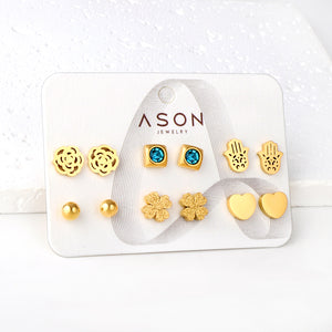 Six pairs of mixed card mounted cut-out palm / glossy heart stud earrings gold color